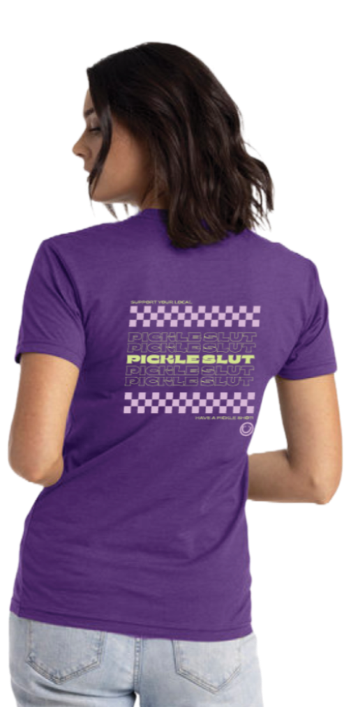 Model wearing the purple Support Your Local Pickle Slut tee, back view showing the checkerboard print