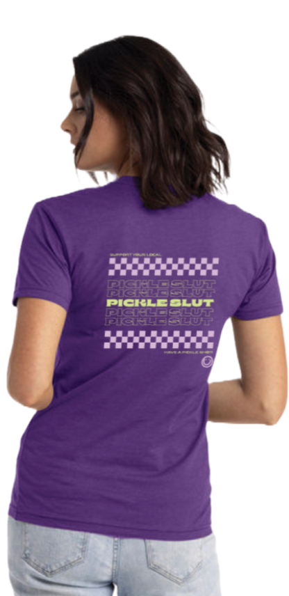 Model wearing the purple Support Your Local Pickle Slut tee, back view showing the checkerboard print